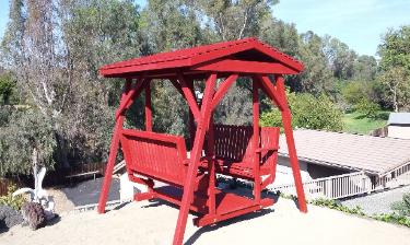 Redwood Stained Face to Face Glider Swing